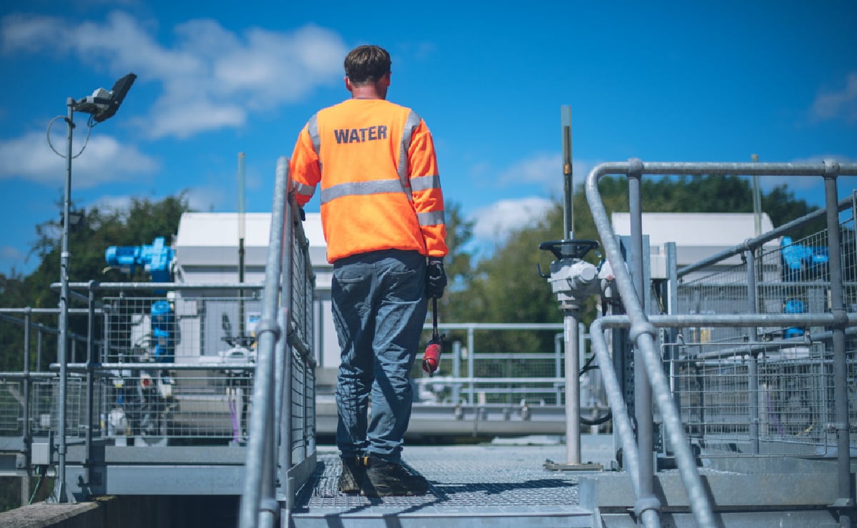 Lone worker outside at the Wessex Water plant in West England, U.K.