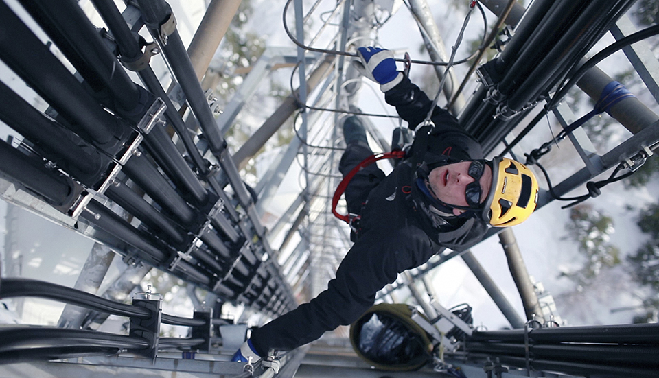 Workers on communication tower